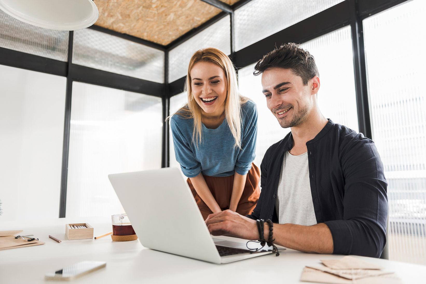 Happy smiling office workers in bureau